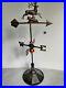 Decade_old_Decorative_John_Deere_Design_Weather_Vane_on_a_weighted_metal_stand_01_rpq