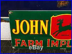 JOHN DEERE PORCELAIN ADVERTISING SIGN, (DATED 1953), NICE CONDITION, 24x 8.5
