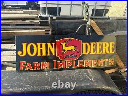 John Deere Black Farm Implements 36x12 Single Sided Porcelain Enamel Sign