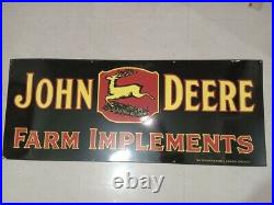 John Deere Black Farm Implements 60x24 Single Sided Porcelain Enamel Sign