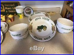 John deere collectibles 12 piece plate and bowl set, mugs, pictures, signs etc